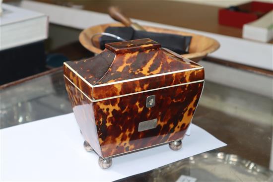 An early 19th century white metal mounted tortoiseshell sarcophagus tea caddy H.15cm, W.15cm